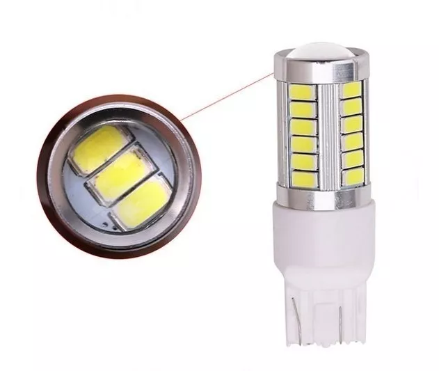 Imagen ilustrativa de LED T20 SMD CANBUS CON LUPA 2 POLOS 12V