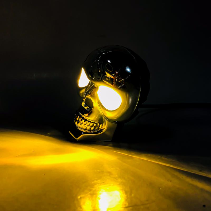 Imagen ilustrativa de CALAVERA CON ILUMINACION EN LOS OJOS FUNCIONES BLANCA / AMBAR / BLANCA + AMBAR + FLASH + RGB 12V / 24V MEDIDAS 8,5 CM * 6,5 CM * 5,3 CM