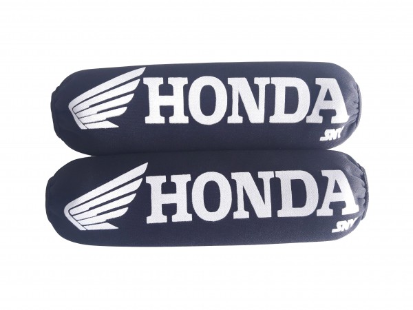 Imagen ilustrativa de FUNDA CUBRE AMORTIGUADORES - DIFERENTES COLORES